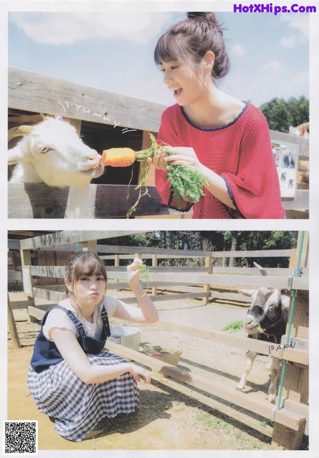 A woman feeding a goat a carrot in a pen.